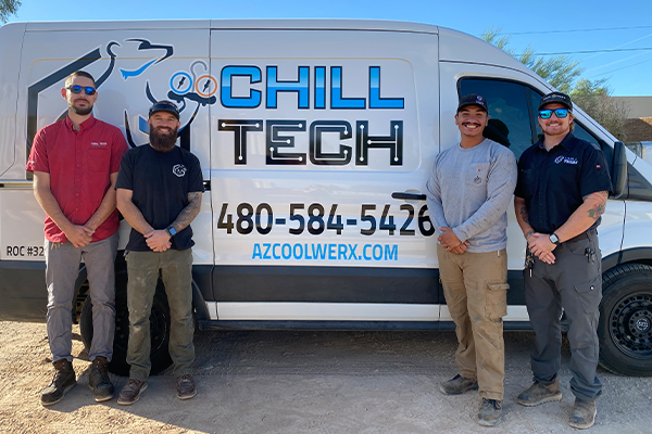Chill Tech team standing in front of a Chill Tech branded van
